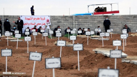 (FOTO) L'ultimo saluto degli Izadi ai loro cari, vittime del Daesh 