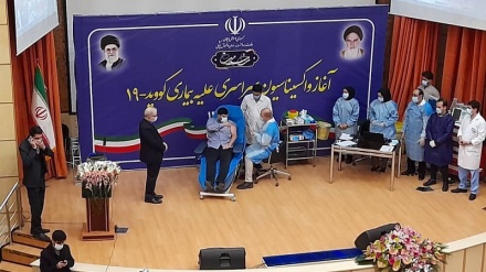 伊朗卫生部长儿子向医护人员表示敬意