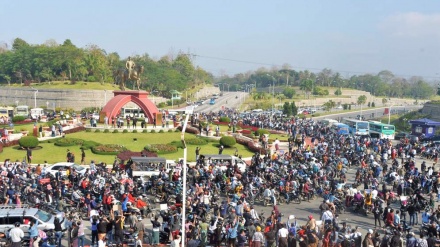 Myanmar military pledges new election as thousands join anti-coup protests