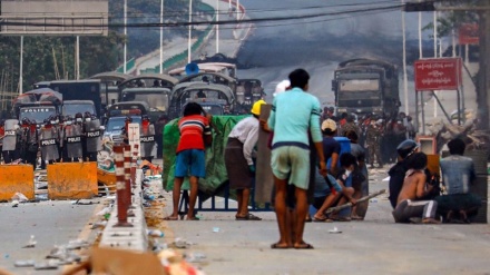 Yangon protesters defiant as security forces open fire