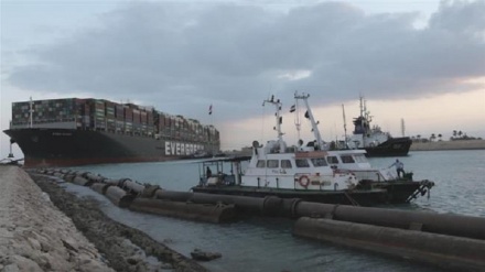 Suez Canal Authority says stranded ship partially refloated