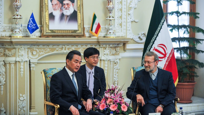 Menlu Cina Wang Yi and Ali Larijani