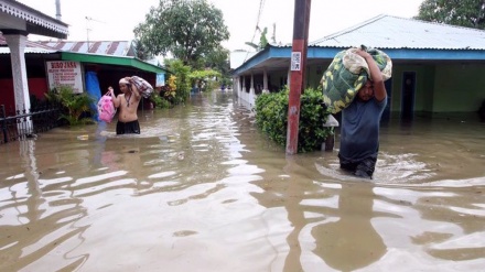  Floods, landslides kill dozens in Indonesia and neighboring East Timor 