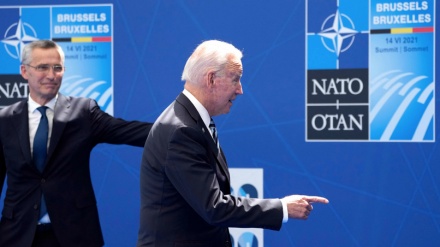 Biden calls NATO's common military pact 'a sacred obligation'