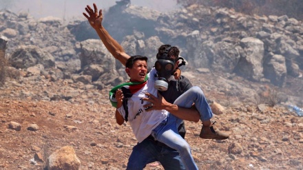 Zionist forces injure dozens of Palestinians in West Bank