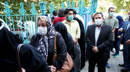People cast their votes for the 13th presidential election in Tehran