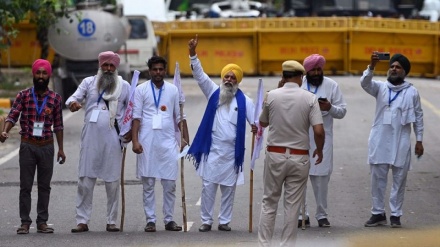 Indian farmers stage sit-in near parliament against new agricultural laws