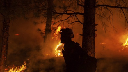 Blaze defies US firefighters, power firm under scrutiny