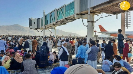 Desperate Afghans crowd Kabul airport apron to flee Taliban