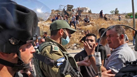 Israeli troops force another Palestinian to demolish own home