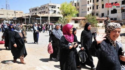 Thousands of Syrians return to their homes after terrorists leave city