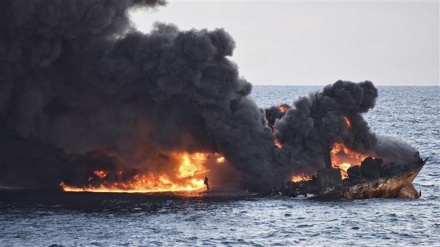 Burning ship carrying chemicals spews toxic gas off Canada's Pacific coast