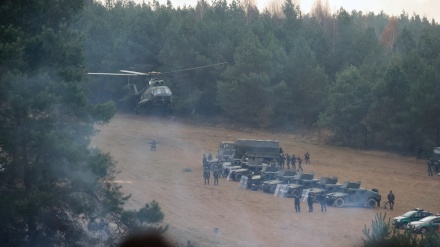 Belarus warns of harsh military response as migrant dispute persists