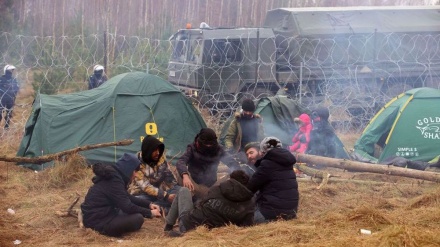 Neighbors of Belarus warn migrant crisis might escalate into military confrontation
