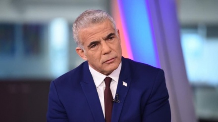 לפיד גינה את צעדת הדגלים הלא חוקי