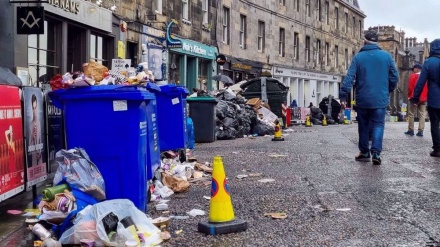 Strike by waste workers in Scotland fills streets with garbage