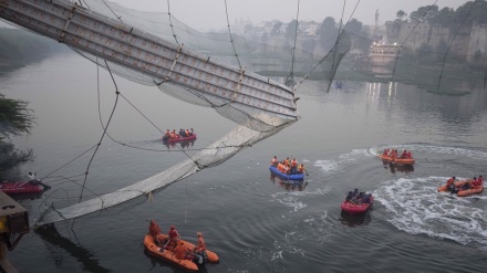 Nine arrested after India bridge collapse kills more than 130