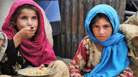 Iranian embassy distributes winter fuel among poor in Kabul