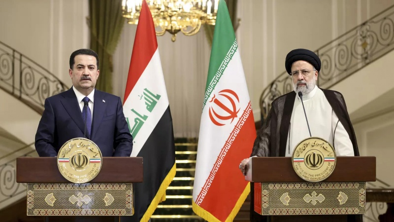 イラクのスーダーニー首相とイランのライセィー大統領（アーカイブ写真）