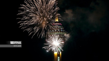 Milad Tower lit with colors to mark Iran's Islamic Revolution anniv.