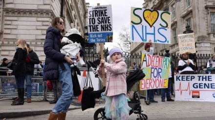 Protesters in London back health staff as doctors prepare to strike