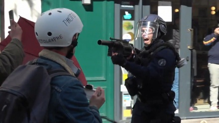 French police attack protesters after government's 'pension reform' plan approved