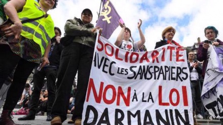 Thousands of protesters demonstrate across France, slamming government's immigration plans