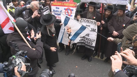 在伦敦古都斯日游行 拉比们焚烧了以色列国旗