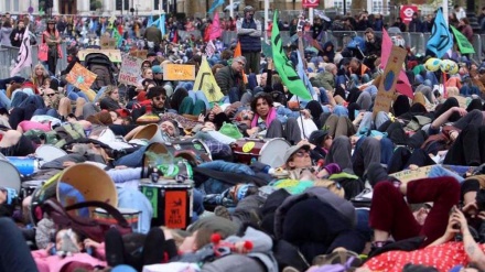 Thousands rally outside UK parliament to protest government’s environmental failures