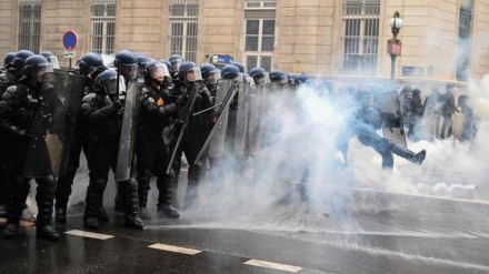 French police fire tear gas, clash with Labor Day protesters amid simmering anger over pension reform