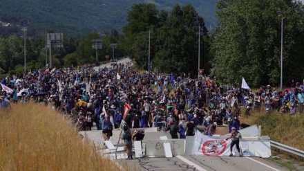 A dozen French police wounded in clashes with protesters opposing rail link in Alps