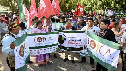 Indigenous people march in Belem as the Amazon Summit kicks off