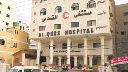 Israel threatens to bomb Gaza hospital housing 12,000 Palestinians
