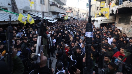 Palestinian resistance forces parade in Balata refugee camp