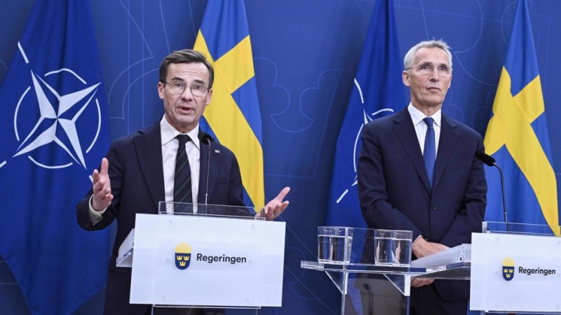 Swedish Prime Minister Ulf Kristersson, left, & NATO Secretary General Jens Stoltenberg