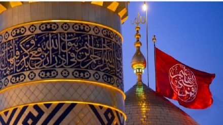 پرچم سرخ بر فراز گنبد حرم امام حسین (ع) برافراشته شد