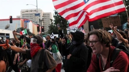 Curfew imposed in Los Angeles as clashes escalate