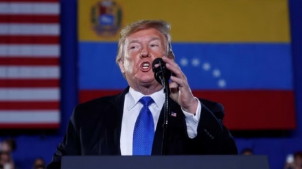 What is the behind-the-scenes reason for the U.S. threat to attack Venezuela?