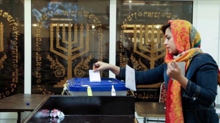 How many representatives minorities have in Iran’s Parliament